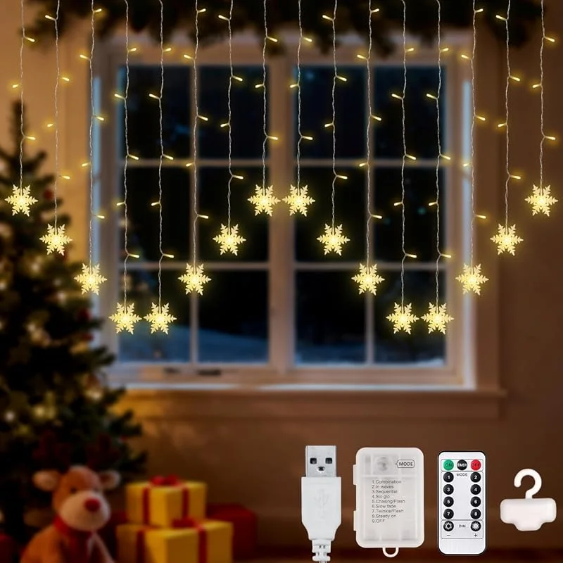 Visita la tienda de Lypumso Lypumso Cortina de Luces Navidad, 2x1M 104 LED Copos de Nieve Luces de Navidad 8 Modos con Gancho, Guirnalda Luces Batería, USB IP44, Decoracion Navideña Interior Exterior, Ventana, Balcón, Fiesta