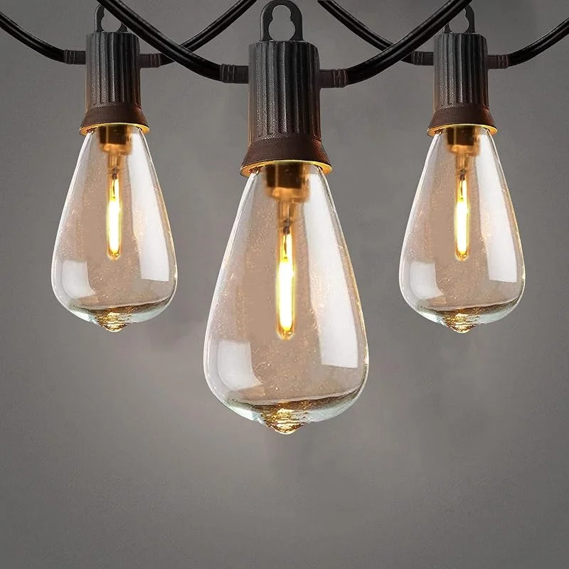 Visita la tienda de ZOTOYI ZOTOYI Guirnalda Luces Exterior, 15 Metros ST38 Guirnaldas Luminosas de Exterior con 20+2 Filamento LED Bombillas, Vintage Edison Cadena de Luz para Jardín Fiesta Boda Patio Cafe Terraza — Luces Navidad
