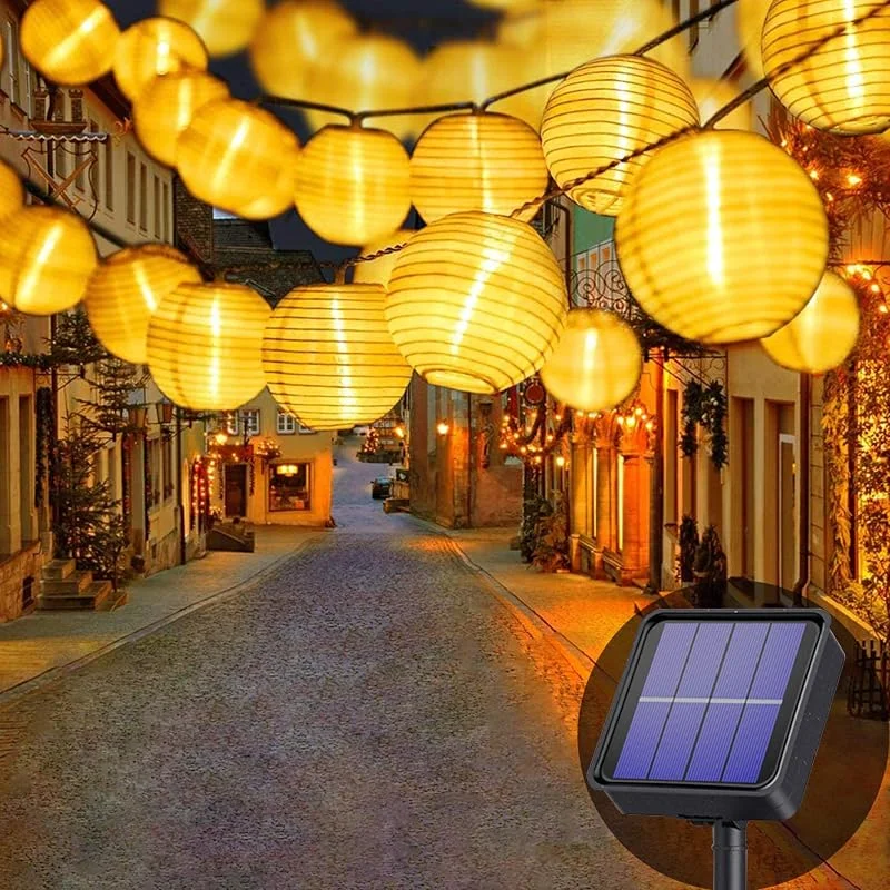 Visita la tienda de Lezonic Lezonic Guirnaldas Luces Exterior Solar, 8 Modos, 30 Farolillos LED, iluminación Solar Para Jardín, Balcón, Patio, Boda, Navidad, Fiesta Decoración (Blanco Cálido) — Luces Navidad