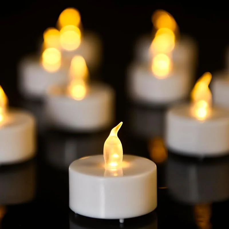 Biyanuo Velas de té LED 150 piezas sin llama pilas velas realistas y brillantes parpadeantes Tealights Extra Larga Batería 200+ horas para bodas, festivales, fiestas, decoración del hogar — Cena a la luz de velas
