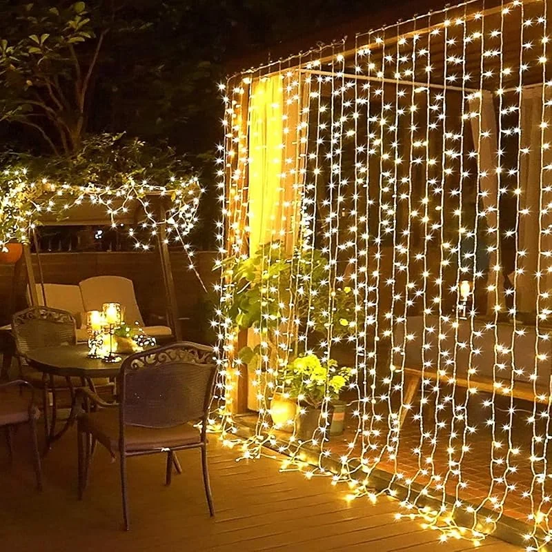 Visita la tienda de Elegear Elegear 6M x 3M Cortina Luces Exterior con Enchufe, Guirnaldas Luz Prolongable, 8 Modos Luz de Cascada para Navidad Natal Boda Fiestas Casa Jardín Patio Balcón Bar, 600 LED, Blanco Cálido — Decoracion Navidad